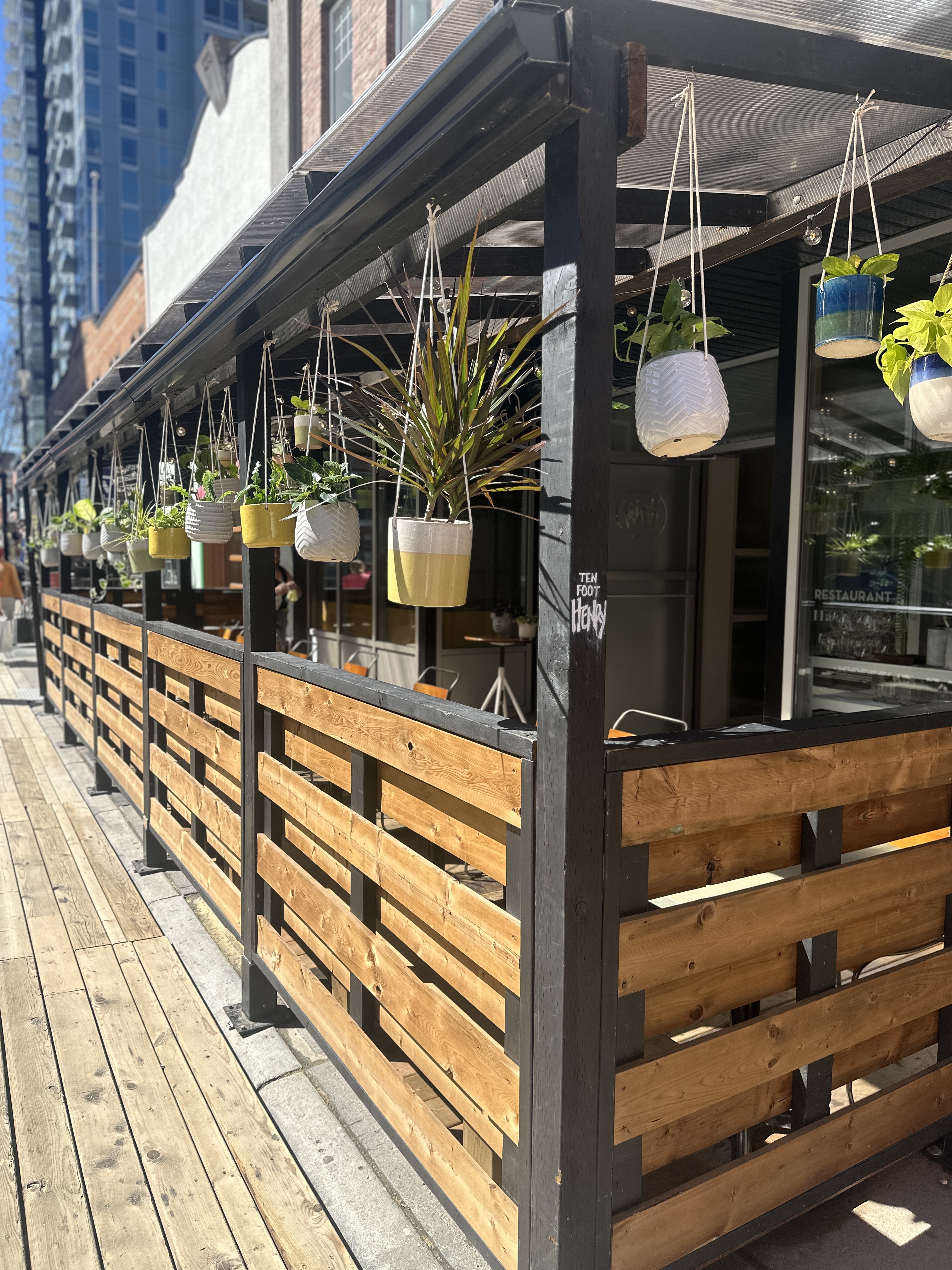 Sidewalk Patios / Ten Foot Henry